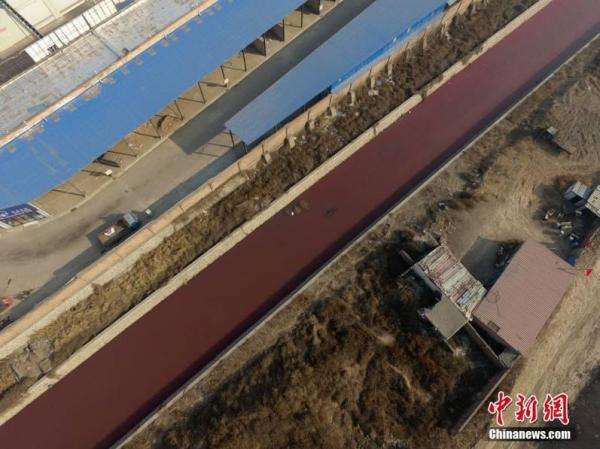 涂料厂颜料染红排污渠：污染源为玫瑰精 专家称无害